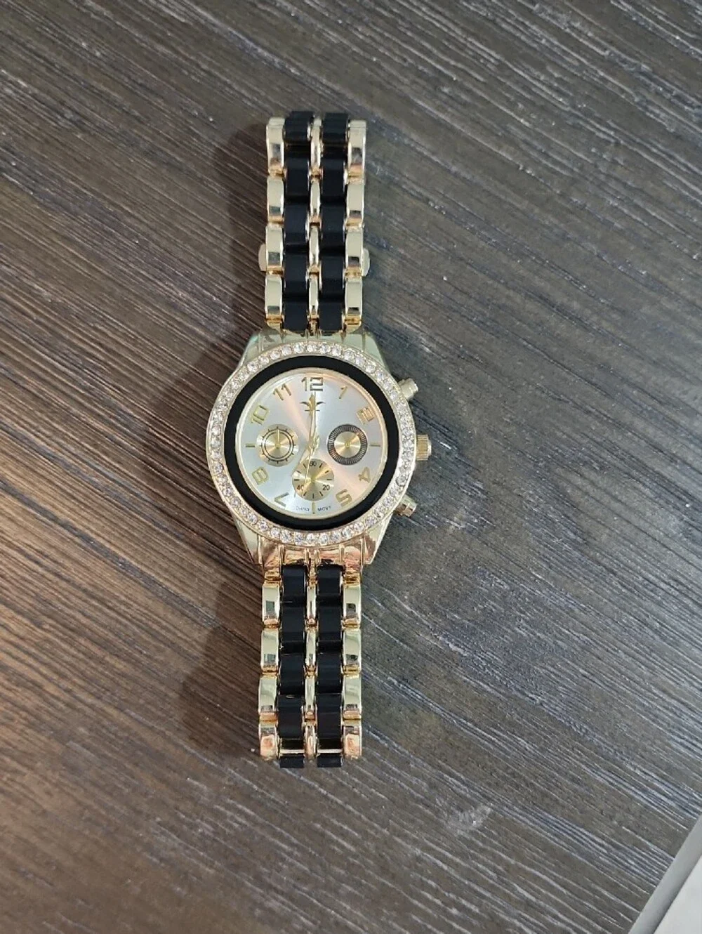 Gold Tone Bracelet Watch with Black Links